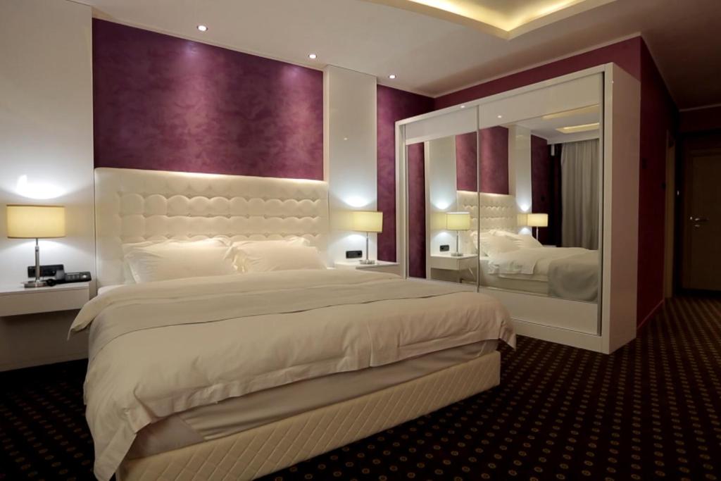 Postel nebo postele na pokoji v ubytování Orbis Design Hotel & Spa