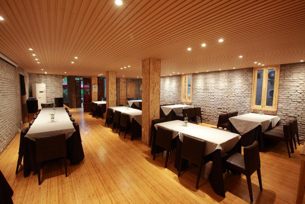 Postel nebo postele na pokoji v ubytování Tong Sang Art Hotel