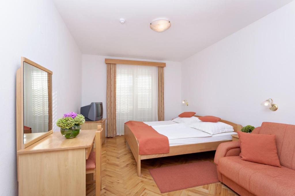 Postel nebo postele na pokoji v ubytování Hotel Epario
