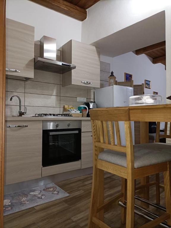 Kuchyň nebo kuchyňský kout v ubytování Bed and breakfast Raggio di Sole