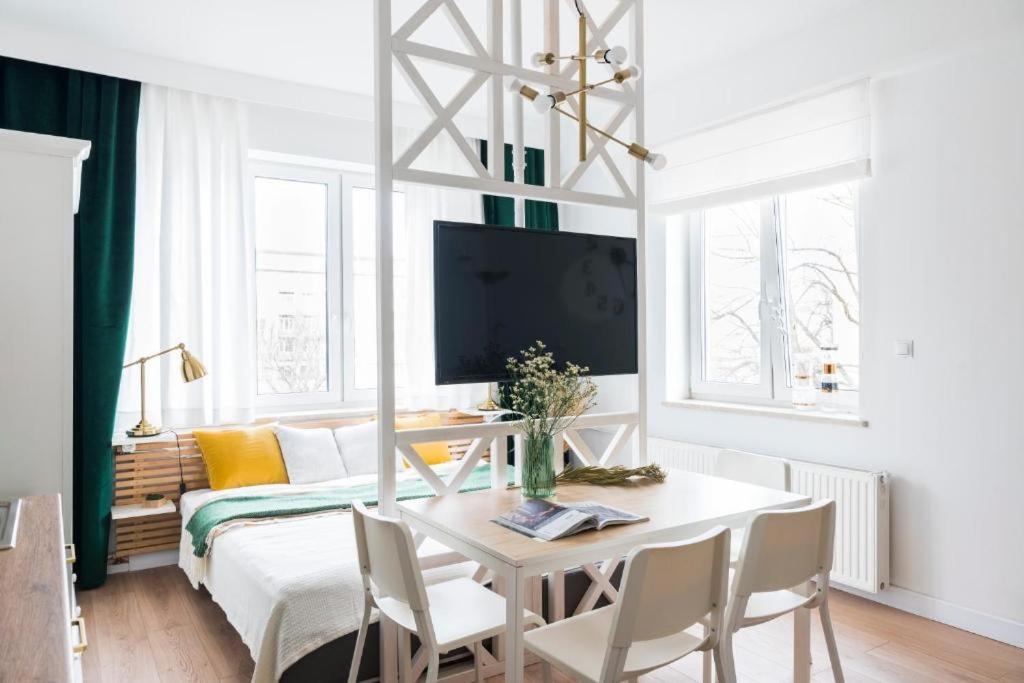 Televízia a/alebo spoločenská miestnosť v ubytovaní Lux Apartment II