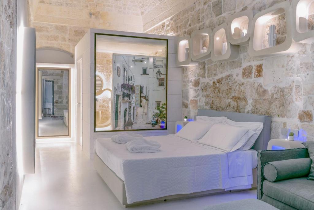 Postel nebo postele na pokoji v ubytování Vico Bianco Raro Smart Rooms Collection