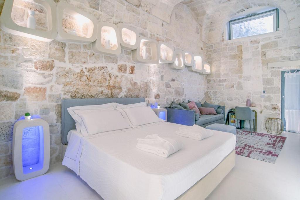 Postel nebo postele na pokoji v ubytování Vico Bianco Raro Smart Rooms Collection