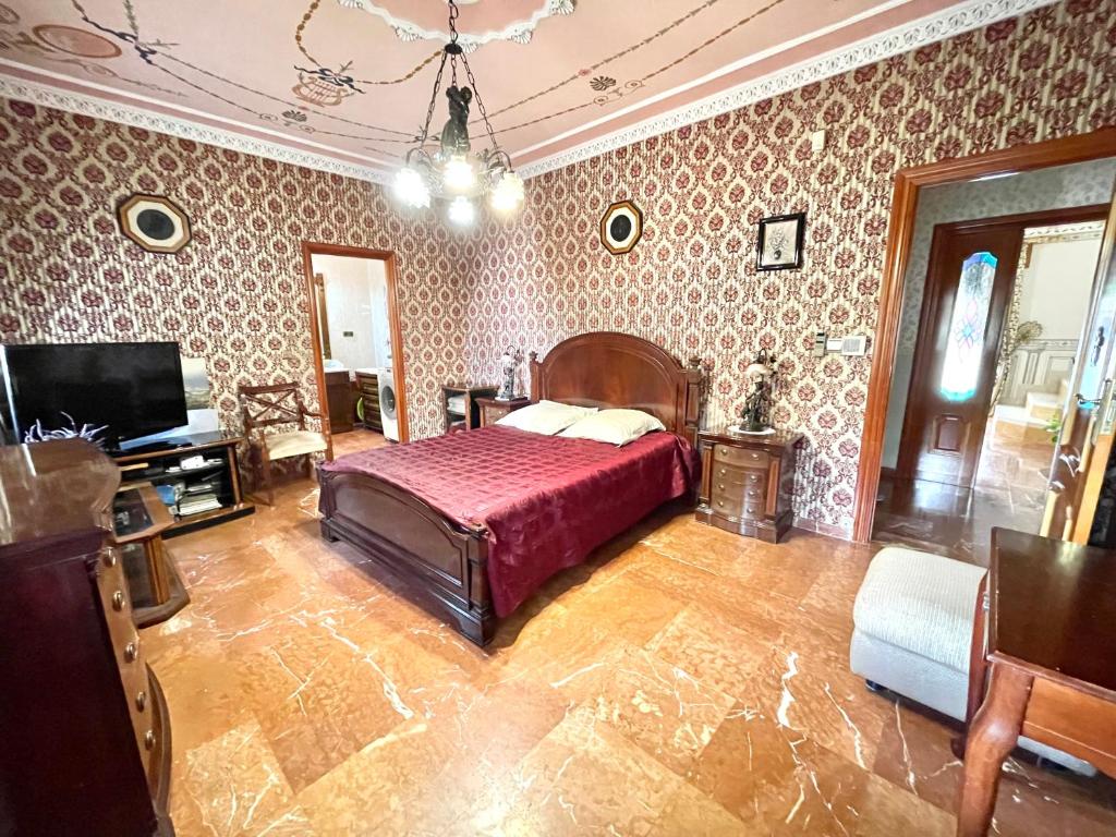 Televízia a/alebo spoločenská miestnosť v ubytovaní Villa del Arte La Nucia