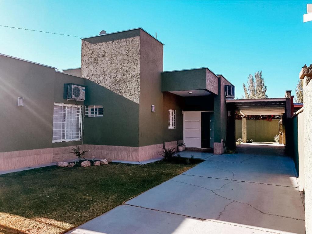 a large house with a green at Casa Verde in San Rafael