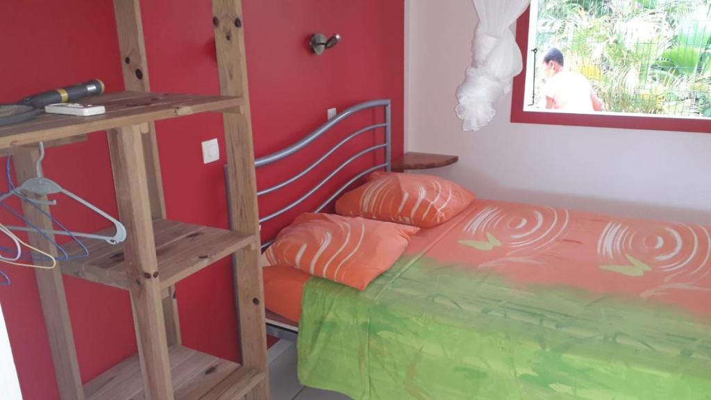 Postel nebo postele na pokoji v ubytování ti case gwada location