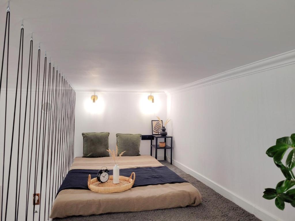 Postel nebo postele na pokoji v ubytování Narutowicza 41 Apartments