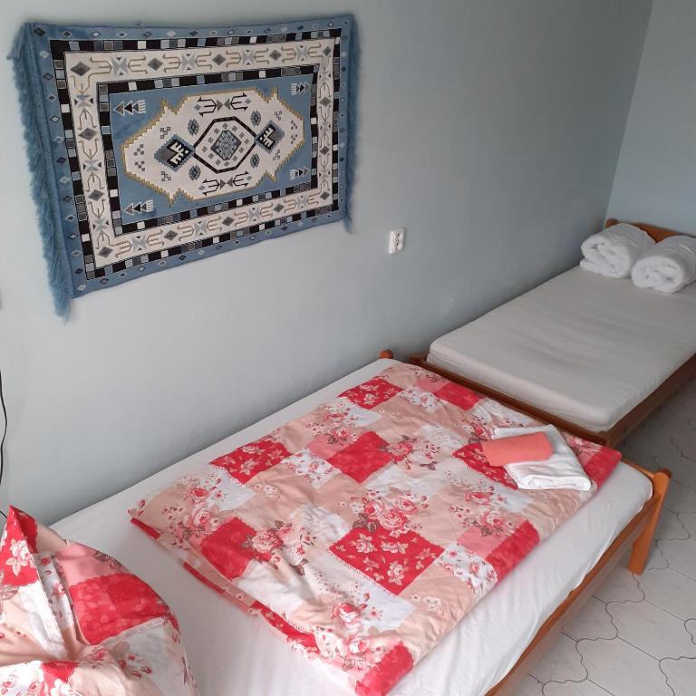 Łóżko lub łóżka w pokoju w obiekcie Apartma Františkovy Lázně