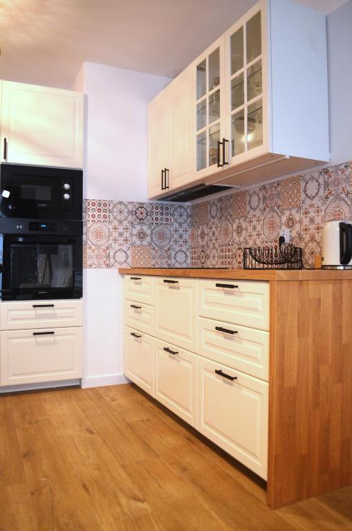 Kuchyňa alebo kuchynka v ubytovaní Lighter Apartment