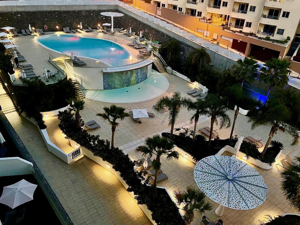 The swimming pool at or close to Ocean Garden Sunset Apartment - heated swimming pool Free WIFI