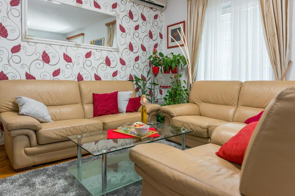 Posezení v ubytování Lovely Apartment