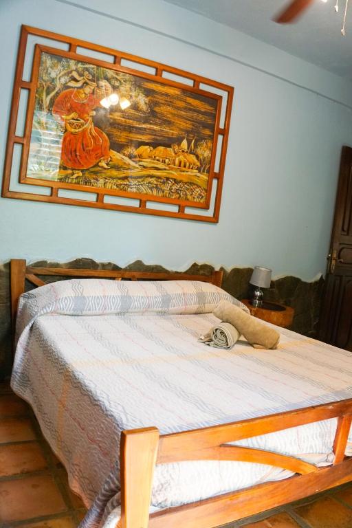 Postel nebo postele na pokoji v ubytování Hotel Boruca Tamarindo