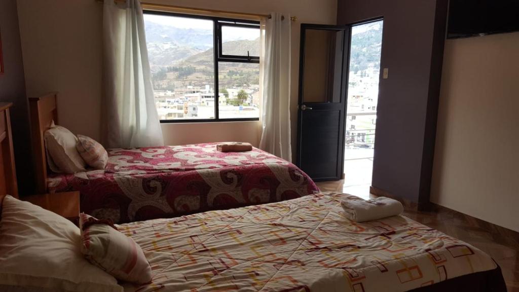 Postel nebo postele na pokoji v ubytování Hostal Resto - Bar "EL PEÑÓN"