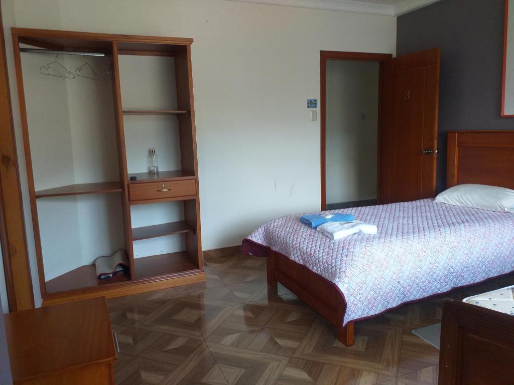 Postel nebo postele na pokoji v ubytování Hostal Resto - Bar "EL PEÑÓN"