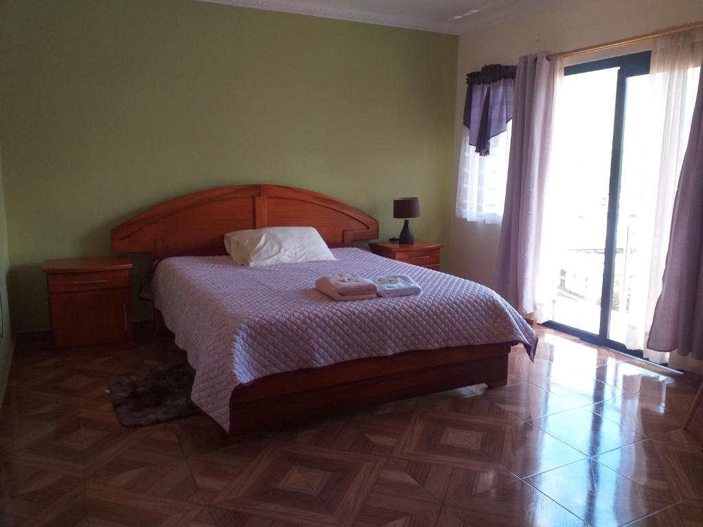 Postel nebo postele na pokoji v ubytování Hostal Resto - Bar "EL PEÑÓN"