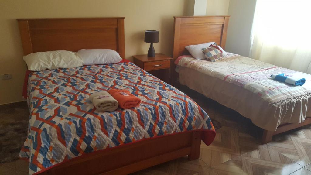 Postel nebo postele na pokoji v ubytování Hostal Resto - Bar "EL PEÑÓN"