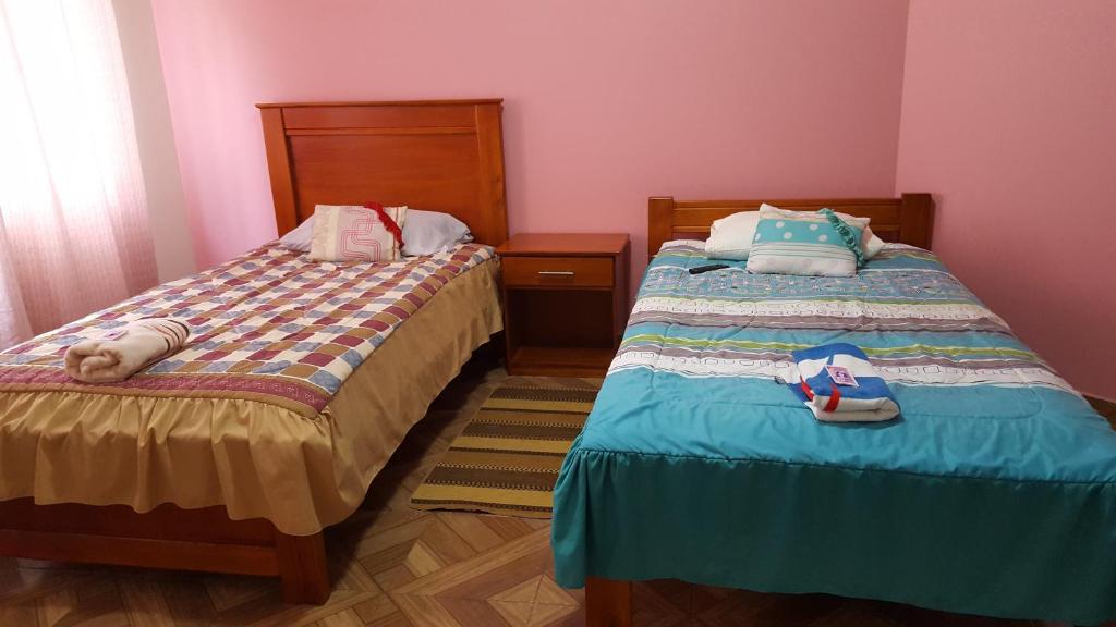 Postel nebo postele na pokoji v ubytování Hostal Resto - Bar "EL PEÑÓN"