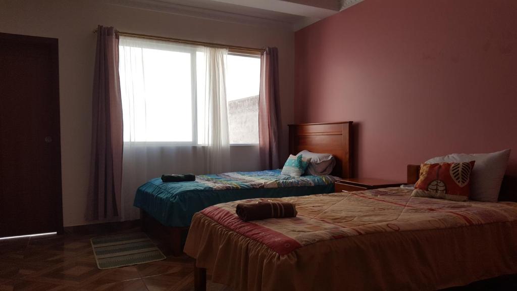 Postel nebo postele na pokoji v ubytování Hostal Resto - Bar "EL PEÑÓN"