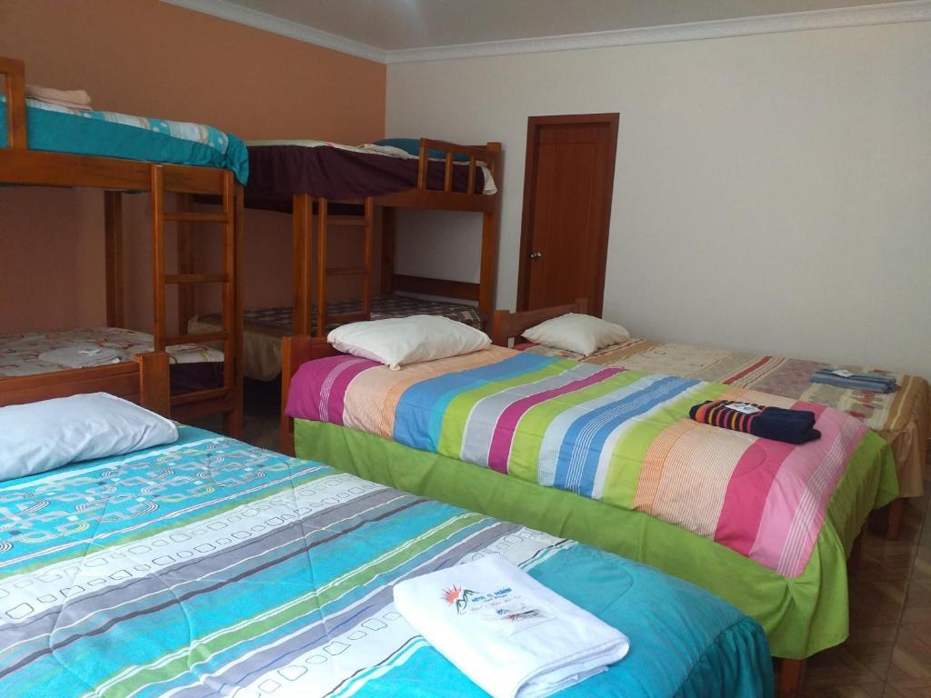 Postel nebo postele na pokoji v ubytování Hostal Resto - Bar "EL PEÑÓN"