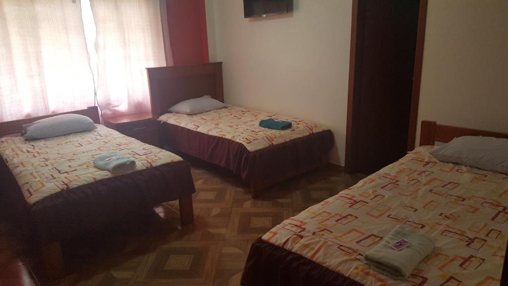 Postel nebo postele na pokoji v ubytování Hostal Resto - Bar "EL PEÑÓN"