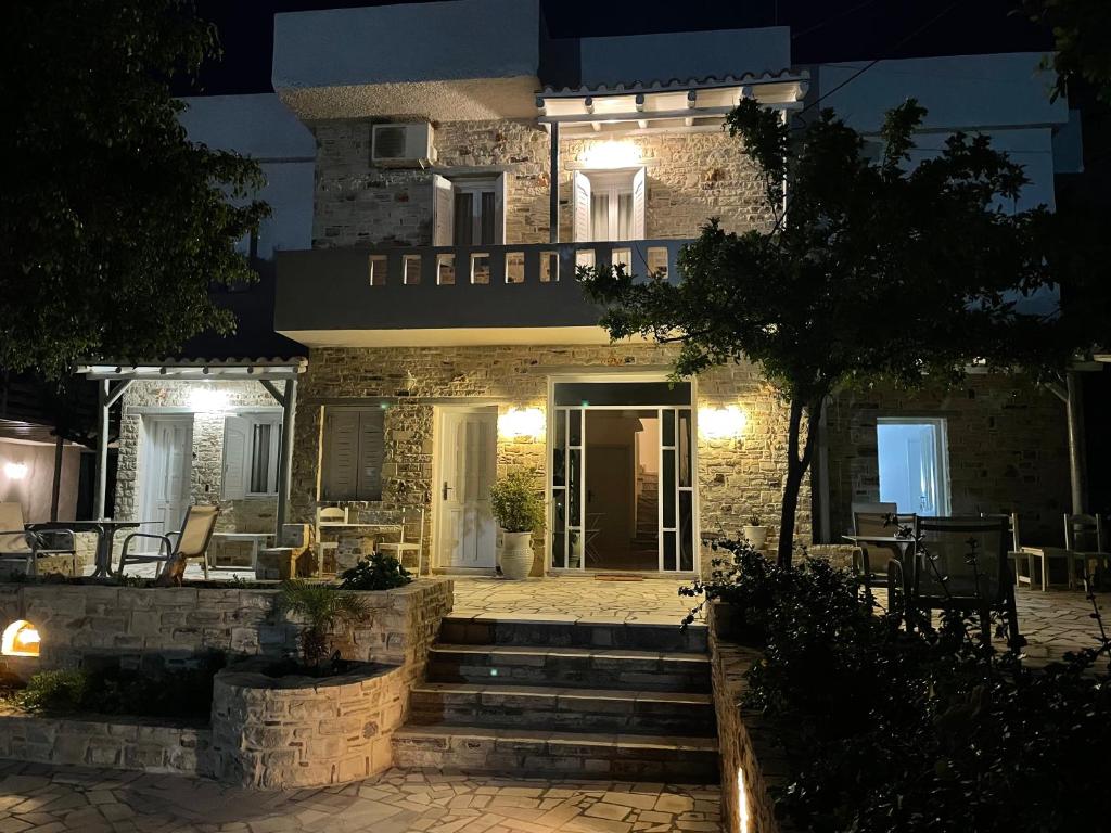 a home at night with the front door lit up at Villa Sylvia in Matala