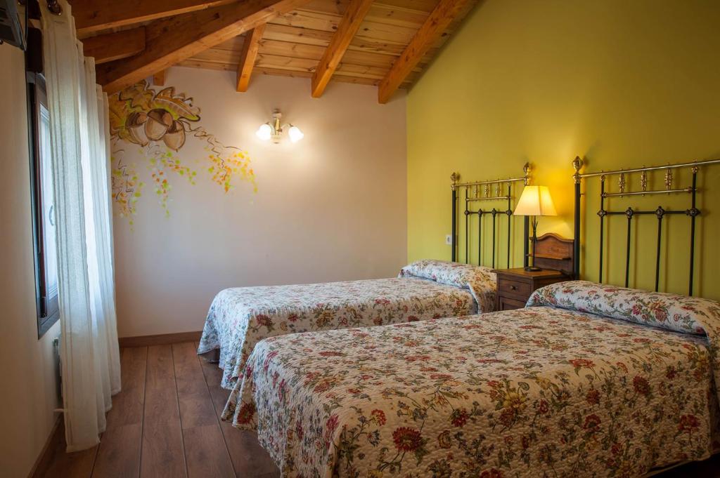 A bed or beds in a room at Los Robles I