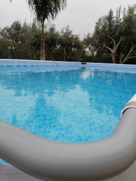 Bazén v ubytovaní Villa Caterina alebo v jeho blízkosti
