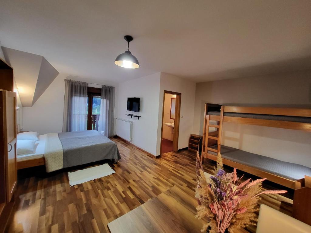 Postel nebo postele na pokoji v ubytování House Tina