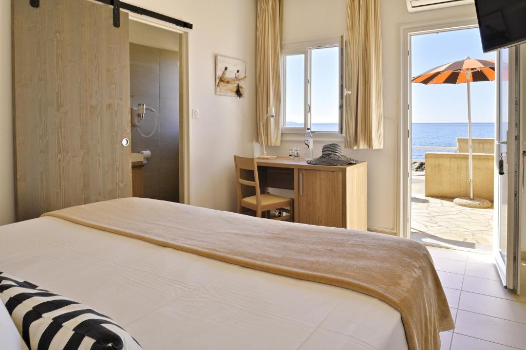 Postel nebo postele na pokoji v ubytování Hotel Stella Di Mare