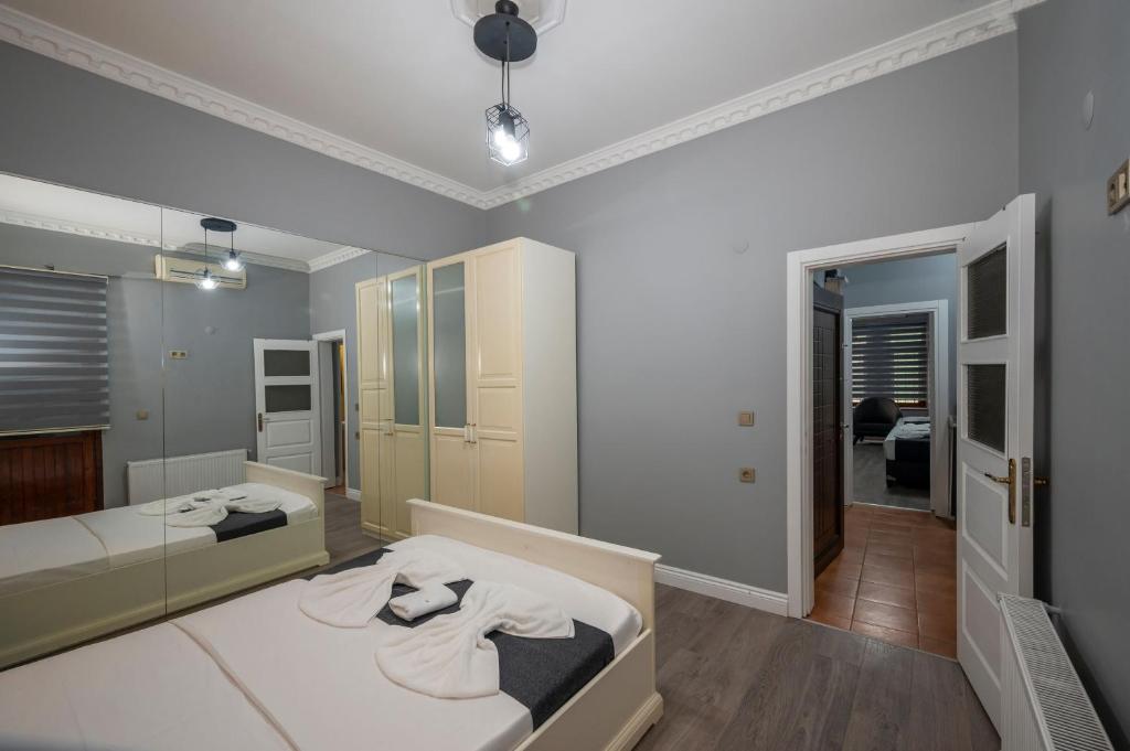 Postel nebo postele na pokoji v ubytování Taxim Trend Apart