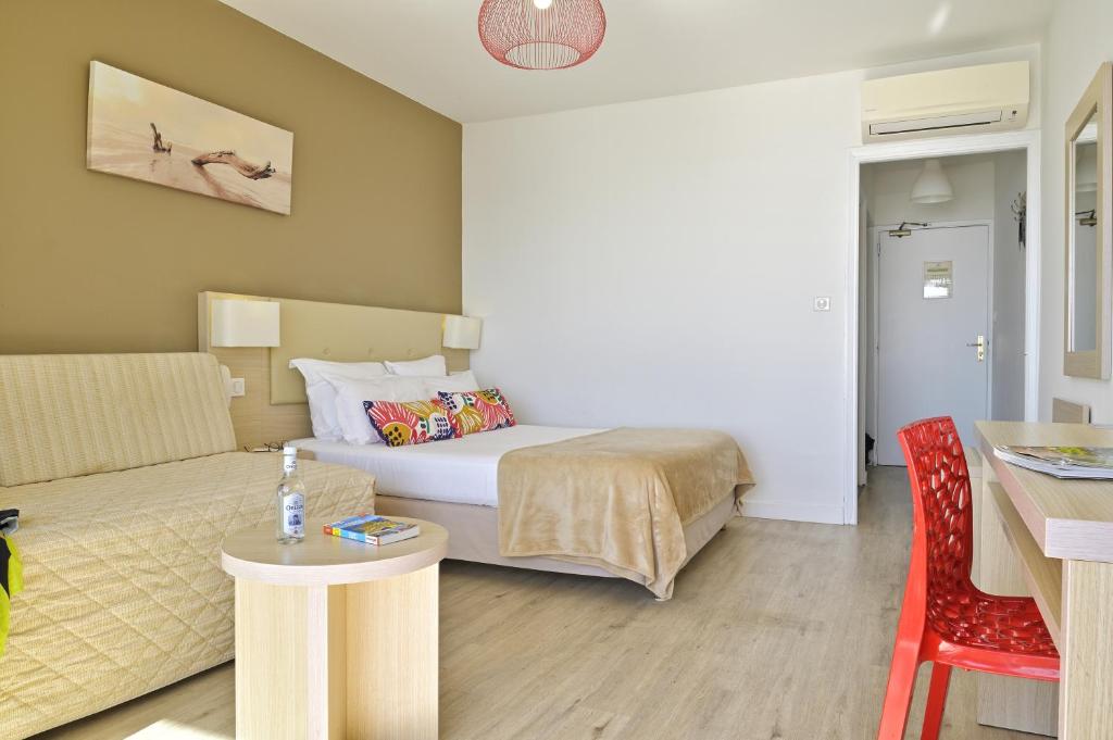 Postel nebo postele na pokoji v ubytování Hotel Stella Di Mare