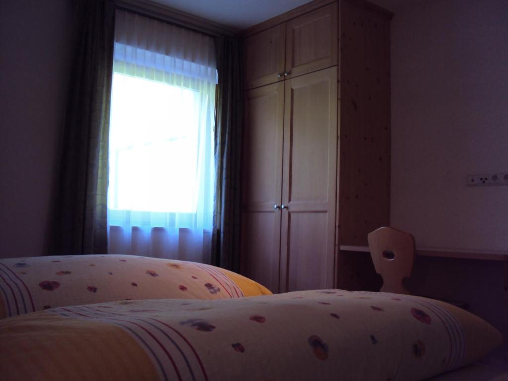 Posteľ alebo postele v izbe v ubytovaní Haus Fliri