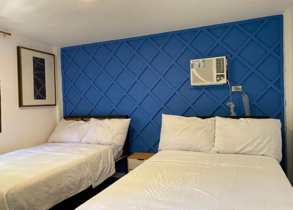 Postel nebo postele na pokoji v ubytování Lido Shores Resort
