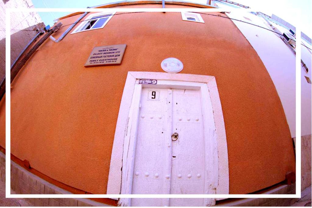 a door in the side of a boat at Soliha&Yulduz Guesthouse in Bukhara