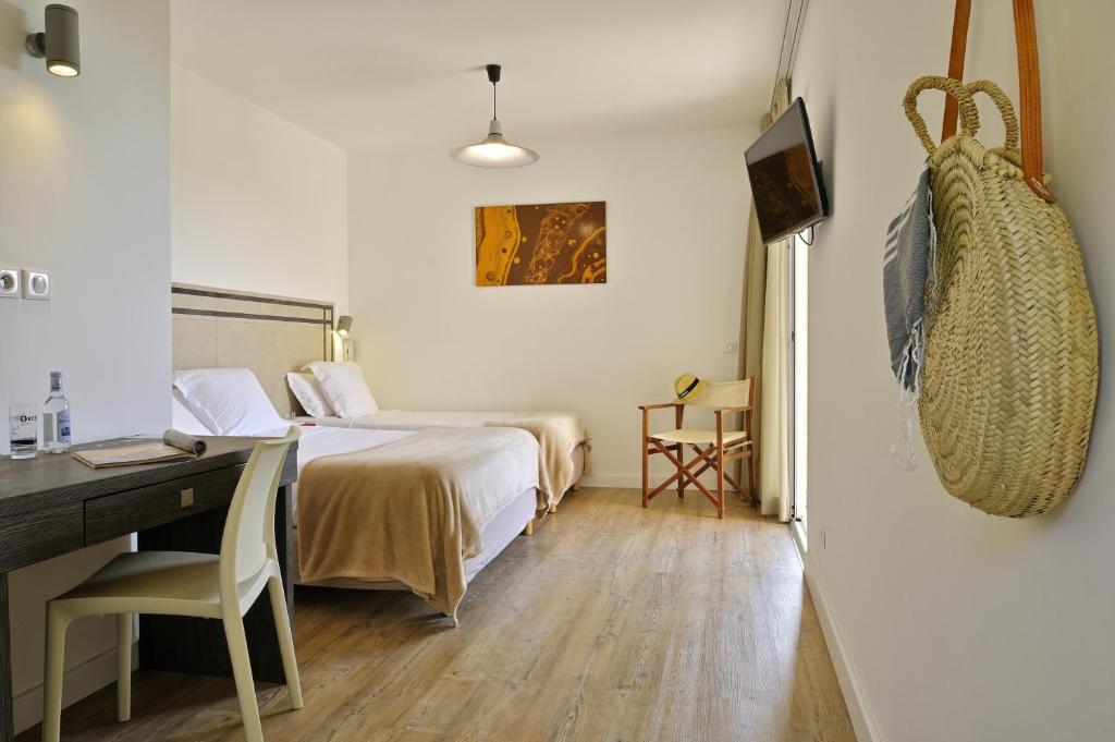Postel nebo postele na pokoji v ubytování Hotel Stella Di Mare
