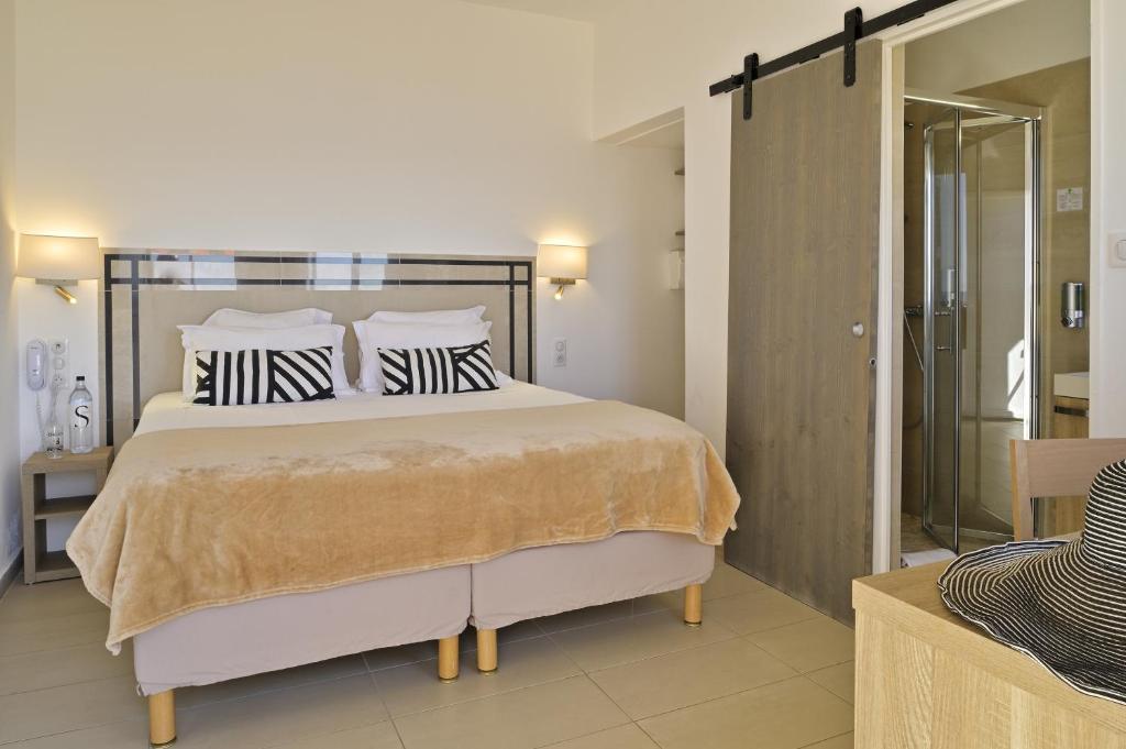 Postel nebo postele na pokoji v ubytování Hotel Stella Di Mare