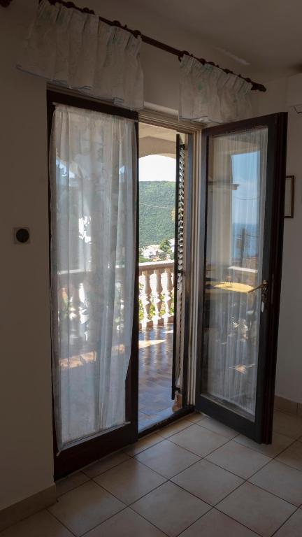 Fotografia z galérie ubytovania Apartment with beautiful sea view v destinácii Rabac