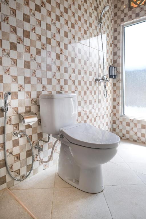 Koupelna v ubytování Kampoeng Joglo Boutique Hotel