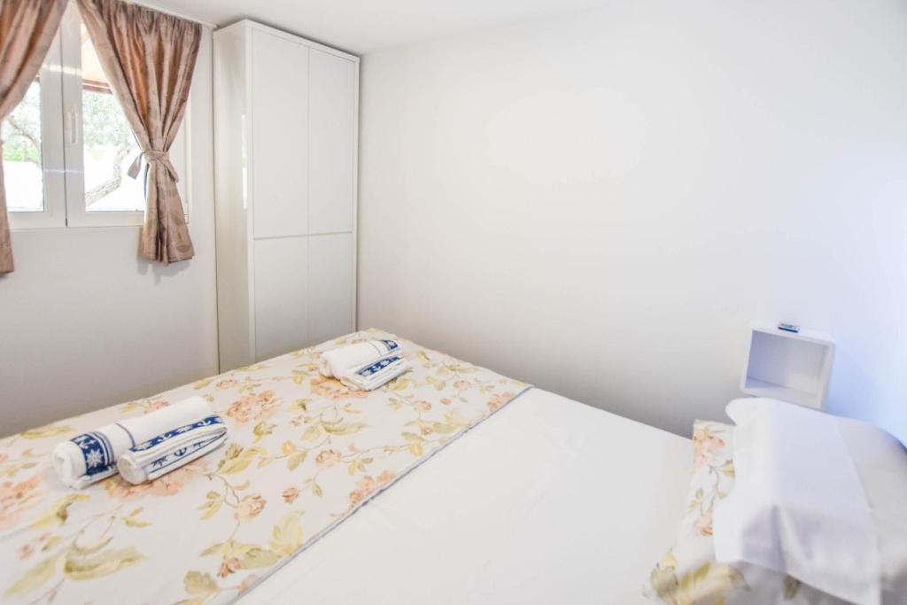 Posteľ alebo postele v izbe v ubytovaní Mobile home Dandelion