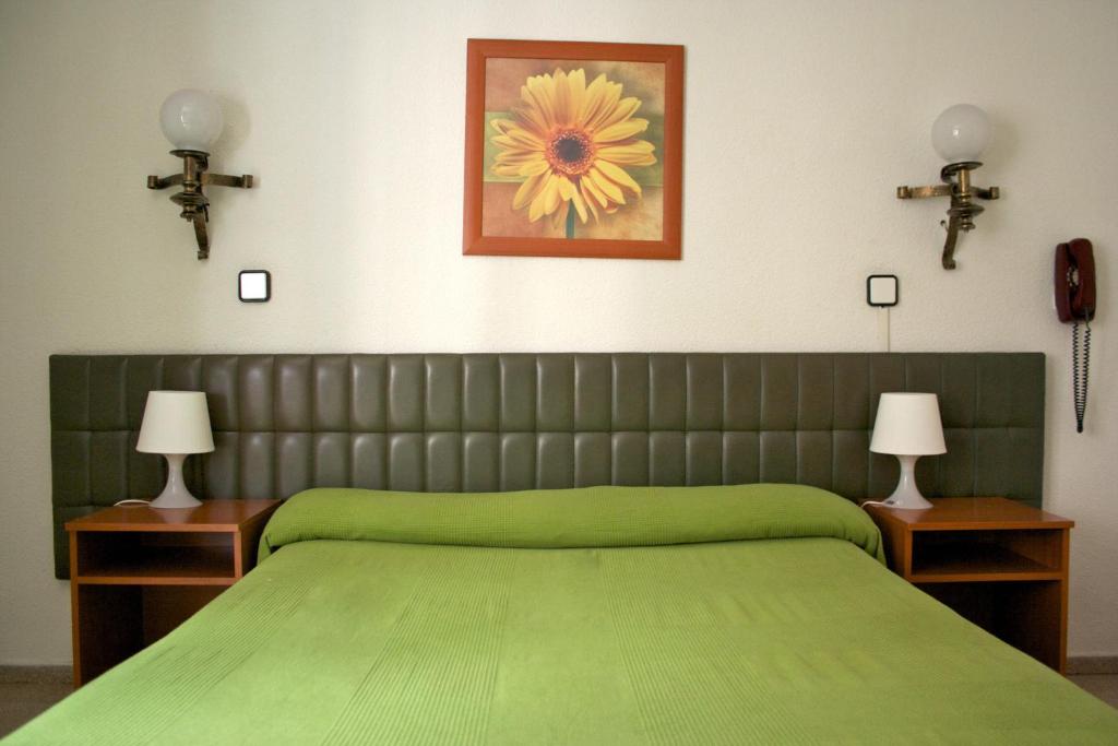 Postel nebo postele na pokoji v ubytování Siracusa