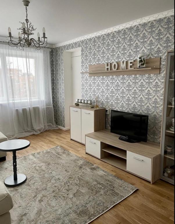 TV a/nebo společenská místnost v ubytování N-J Apartament