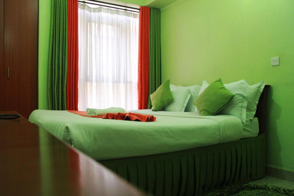 Ένα ή περισσότερα κρεβάτια σε δωμάτιο στο Hotel Winstar