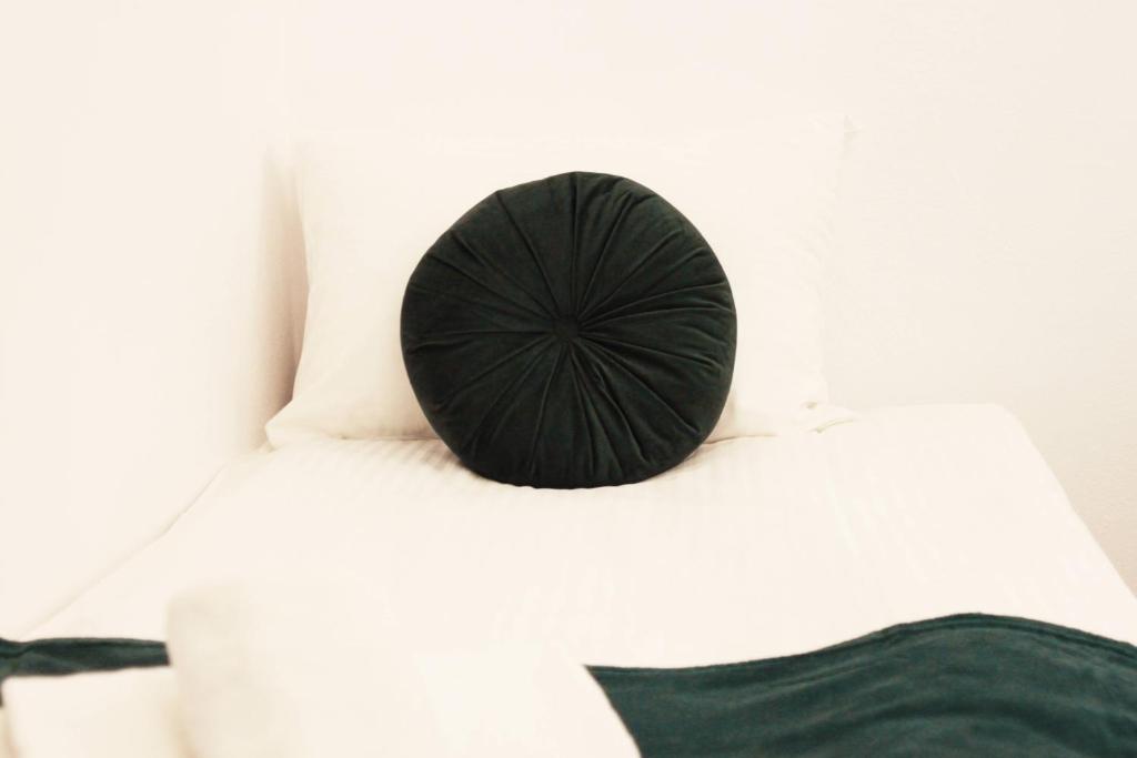 Posteľ alebo postele v izbe v ubytovaní Cosy & Perfect Located Apartment