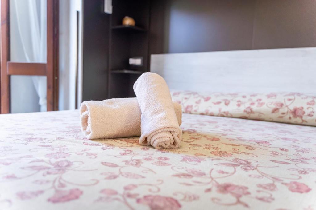 Letto o letti in una camera di Toderix