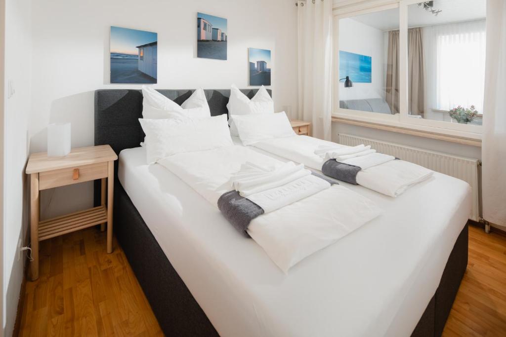 Postel nebo postele na pokoji v ubytování Ferienhaus Papenfuß