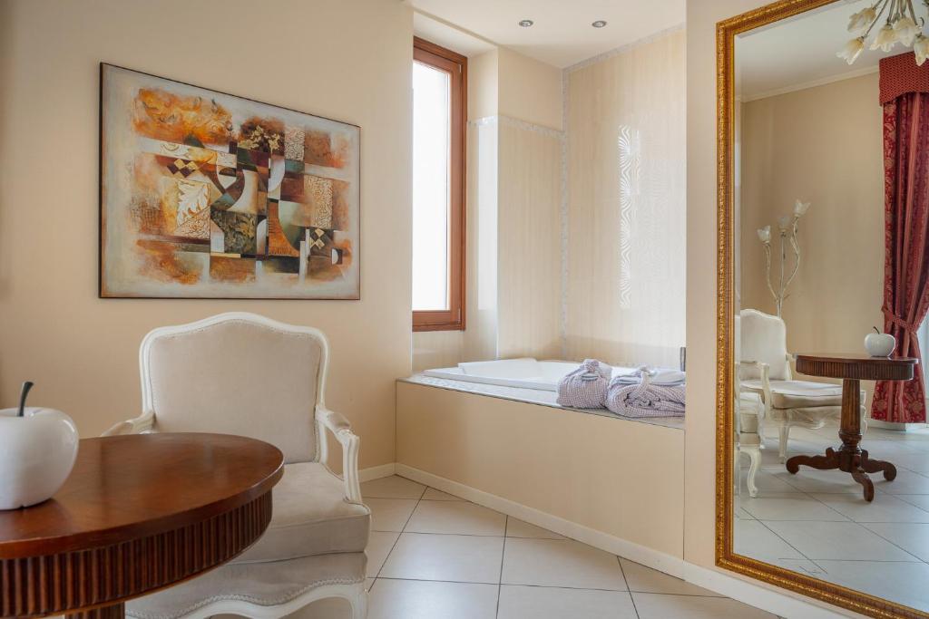 Postel nebo postele na pokoji v ubytování Hotel Mayer & Splendid - Wellness e Spa