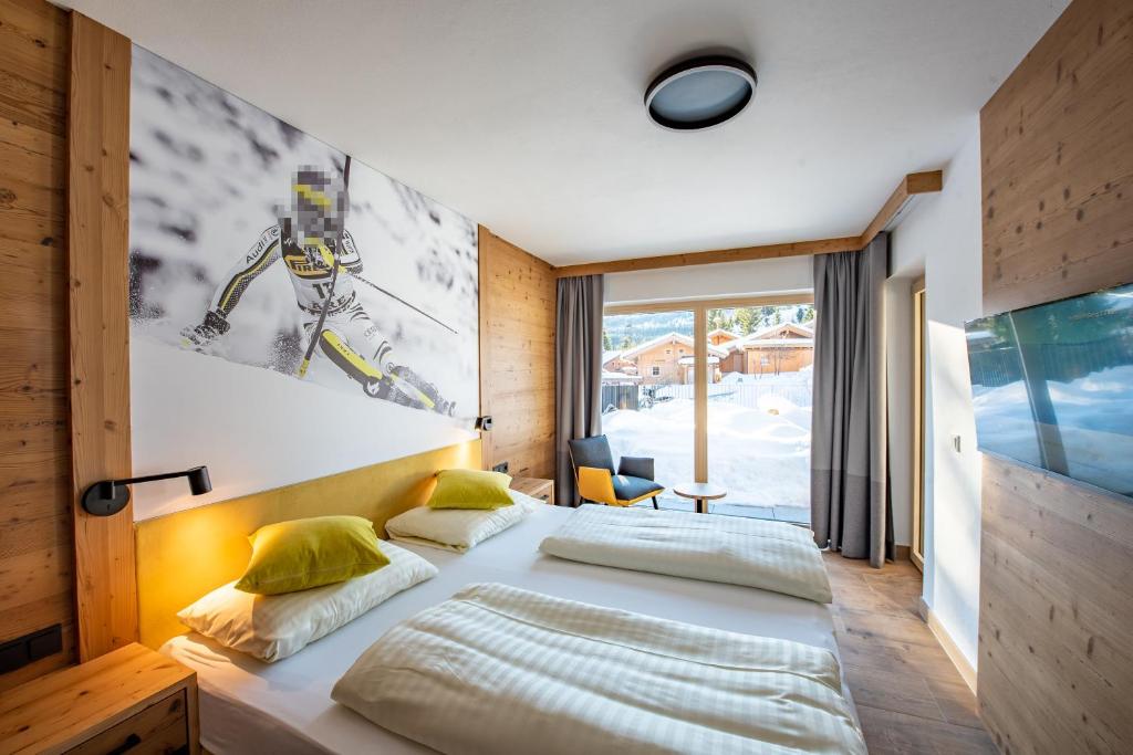 Postel nebo postele na pokoji v ubytování Chalet Königsleiten 148