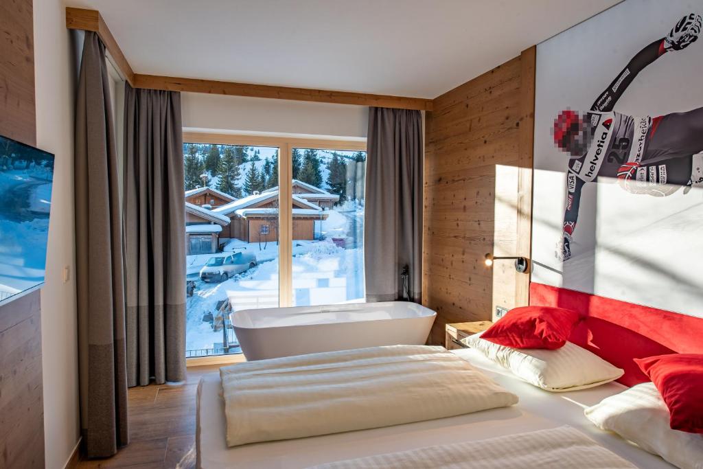 Postel nebo postele na pokoji v ubytování Chalet Königsleiten 148