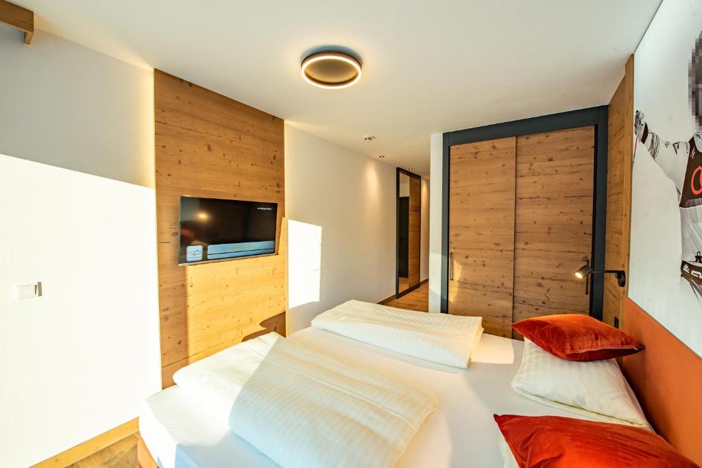 Postel nebo postele na pokoji v ubytování Chalet Königsleiten 148