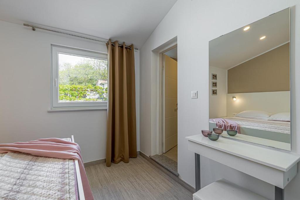 Postel nebo postele na pokoji v ubytování Ferienhaus Prenc